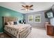 Bright bedroom featuring ample natural light, neutral walls, and a view to the home exterior at 7541 Southern Lakes Dr, Indianapolis, IN 46237