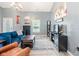 Stylish living room with modern decor, hardwood floors, and ample natural light at 7541 Southern Lakes Dr, Indianapolis, IN 46237