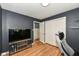 This room has hardwood floors with a closet and door leading into another room at 7725 E 52Nd St, Indianapolis, IN 46226