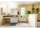 Bathroom with vanity, mirror, and multiple hanging plants creating a spa-like retreat at 8088 Lantern Ln, Pendleton, IN 46064