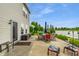 Home's exterior featuring patio, lake view, and outdoor dining set for a relaxing backyard atmosphere at 8088 Lantern Ln, Pendleton, IN 46064