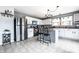 Bright kitchen featuring stainless steel appliances, white cabinets, and a center island with barstool seating at 8088 Lantern Ln, Pendleton, IN 46064
