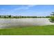 Scenic lake view showcasing peaceful waters and neighborhood homes from the backyard at 8088 Lantern Ln, Pendleton, IN 46064