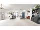 Spacious living area featuring dining table and chairs, and a blue front door at 8088 Lantern Ln, Pendleton, IN 46064