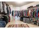 Spacious walk-in closet with extensive built-in organization, a rug, and ample space at 8088 Lantern Ln, Pendleton, IN 46064