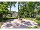 Wooden deck overlooking fenced backyard, providing privacy and space for outdoor activities and gatherings at 8530 Ardennes Dr, Fishers, IN 46038