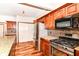 Updated kitchen featuring stainless steel appliances, granite countertops, and stylish backsplash at 8530 Ardennes Dr, Fishers, IN 46038