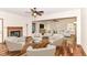 Cozy living room featuring a decorative fireplace and neutral furnishings, creating an inviting space for relaxation and entertaining at 8530 Ardennes Dr, Fishers, IN 46038