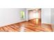 Spacious living room with hardwood floors, natural light, and an open layout at 8530 Ardennes Dr, Fishers, IN 46038