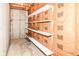 Basement storage area with insulation and shelving for organized storage of items at 8530 Ardennes Dr, Fishers, IN 46038