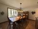 Cozy dining room featuring a wood table and ornate lighting at 8711 E 296Th St, Atlanta, IN 46031