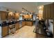 Spacious kitchen featuring stainless steel appliances and dark countertops at 8711 E 296Th St, Atlanta, IN 46031