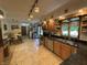 Large kitchen with stainless steel appliances, tile flooring, and a breakfast nook at 8711 E 296Th St, Atlanta, IN 46031