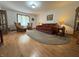 Bright living room with hardwood floors and comfortable seating at 8711 E 296Th St, Atlanta, IN 46031