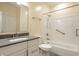 Bathroom features a shower and tub combo with white subway tile and grab bars at 9718 Haughton Ln, McCordsville, IN 46055