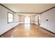 Bright living room features classic trim, hardwood floors and large windows at 10244 Washington Blvd, Carmel, IN 46280