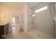 Bright bathroom with glass shower and double vanity at 10586 Jacks Way, Indianapolis, IN 46234