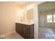 Bathroom features a double sink vanity and modern fixtures at 10586 Jacks Way, Indianapolis, IN 46234