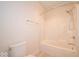 Bathroom with a white tub and shower combination at 10586 Jacks Way, Indianapolis, IN 46234