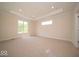 New bedroom featuring recessed lights, tray ceiling, neutral carpet and large window at 10586 Jacks Way, Indianapolis, IN 46234