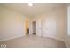 Bright bedroom features neutral carpet, white trim, and ample natural light at 10586 Jacks Way, Indianapolis, IN 46234