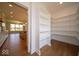 Spacious pantry with custom shelving in a new home with open floor plan at 10586 Jacks Way, Indianapolis, IN 46234