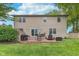 Exterior of home showcasing a large backyard and patio, perfect for outdoor living at 10673 Misty Hollow Ln, Fishers, IN 46038