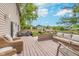 Spacious backyard deck with comfortable seating, great for outdoor entertaining and relaxation at 10673 Misty Hollow Ln, Fishers, IN 46038