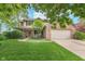 Traditional home featuring a welcoming front porch and a well maintained lawn at 10673 Misty Hollow Ln, Fishers, IN 46038