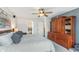 Comfortable bedroom featuring a spacious layout and connecting bathroom at 10673 Misty Hollow Ln, Fishers, IN 46038