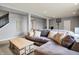 Spacious finished basement with comfortable seating and a rustic wooden chest, perfect for Gathering gatherings at 1071 Serenity Ct, Carmel, IN 46280