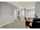 Finished basement featuring neutral paint, stylish furniture, and ample lighting for a cozy atmosphere at 1071 Serenity Ct, Carmel, IN 46280