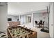 Spacious finished basement featuring a foosball table, living area, and basketball hoop for entertainment at 1071 Serenity Ct, Carmel, IN 46280