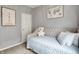 Neutral bedroom featuring a daybed, soft textures and calming decor at 1071 Serenity Ct, Carmel, IN 46280