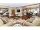 Spacious open-concept living room and dining area with hardwood floors and a cozy atmosphere at 10888 Weston Dr, Carmel, IN 46032