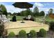 New deck with outdoor seating and umbrella is perfect for entertaining and enjoying the backyard at 1135 W Wildflower Ct, Mooresville, IN 46158