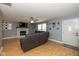 Cozy living room featuring a fireplace, ceiling fan, and recessed lighting at 1135 W Wildflower Ct, Mooresville, IN 46158