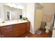 Bathroom featuring a vanity with storage, a large mirror, and a shower with curtain at 1150 Extraordinary Trl, Greenfield, IN 46140
