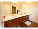 Bathroom featuring a large vanity with dual sinks and a large mirror at 1150 Extraordinary Trl, Greenfield, IN 46140