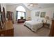 Bedroom with large window, dresser, and bed at 1150 Extraordinary Trl, Greenfield, IN 46140