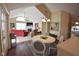 Inviting dining area with modern decor and seamless flow into a living space at 1150 Extraordinary Trl, Greenfield, IN 46140