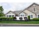 Attractive home with stone detailing, bright windows, and manicured front garden at 1150 Extraordinary Trl, Greenfield, IN 46140
