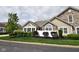 Charming home with stone accents, large windows, and well-manicured landscaping at 1150 Extraordinary Trl, Greenfield, IN 46140