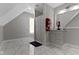 Bathroom with white tile floors, shower with glass doors and a vanity at 1150 W 30Th St, Indianapolis, IN 46208