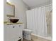 Modern bathroom with marble shower and granite vanity sink at 1150 W 30Th St, Indianapolis, IN 46208