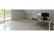 Bonus room featuring neutral carpet, a desk, and a view of the outdoor deck at 1150 W 30Th St, Indianapolis, IN 46208