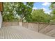 Deck with wood flooring that offers space for gatherings and relaxation at 1150 W 30Th St, Indianapolis, IN 46208