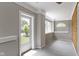 Bright entryway featuring an exterior door, large windows, with view to the outdoors at 1150 W 30Th St, Indianapolis, IN 46208