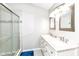 Bright bathroom with tiled shower, double vanity, and modern fixtures at 11612 E 75Th St, Indianapolis, IN 46236