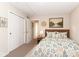 Comfortable bedroom features a large closet, natural light, and neutral colors at 11612 E 75Th St, Indianapolis, IN 46236